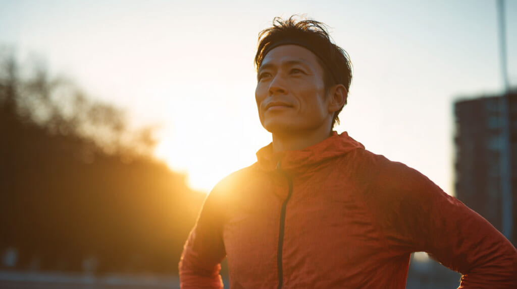 内臓トラブルを克服し余裕の表情を見せる日本人ランナー